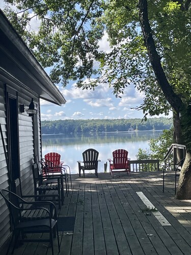 Cozy, lakefront cabin with gas grill and wrap-around deck.