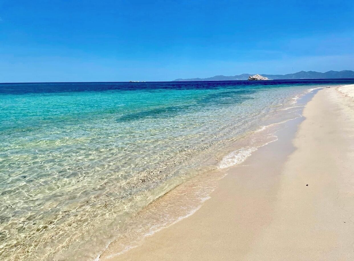 Na praia, toalhas de praia 