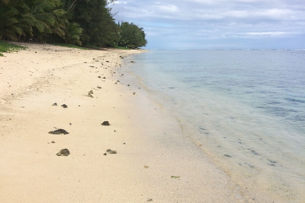 Rannalla, rantapyyhkeitä