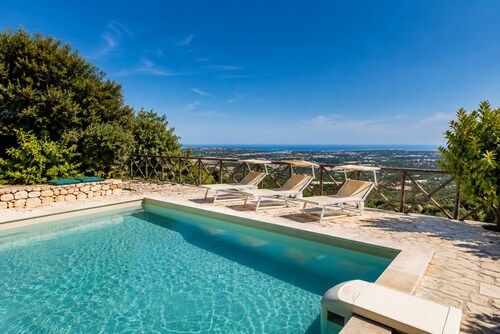 Sea View Trulli Retreat with Panoramic Pool