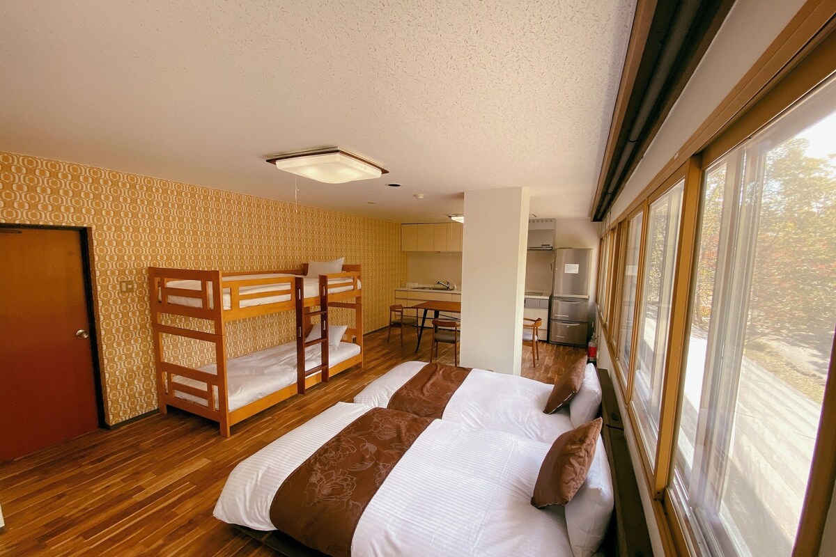 Classic Quadruple Room, Kitchenette | In-room safe, WiFi (free), bed sheets