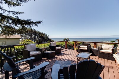 Large beach home with fantastic views of the Oregon Coast with a quaint cabin. 