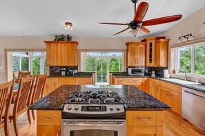 Fridge, microwave, oven, stovetop - Big Kahuna  an expansive and inviting 5-bedroom, 4-bathroom single-family haven that encapsulates the essence of Florida Keys living (Marathon)