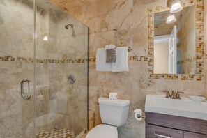 Bathtub, towels, soap, toilet paper - Big Kahuna  an expansive and inviting 5-bedroom, 4-bathroom single-family haven that encapsulates the essence of Florida Keys living (Marathon)