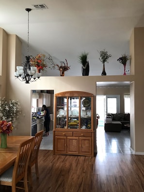 Enjoy a warm and inviting space with a dining area, kitchen, and living space.