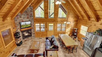 Älytelevisio, takka, videopelejä, pöytätennispöytä