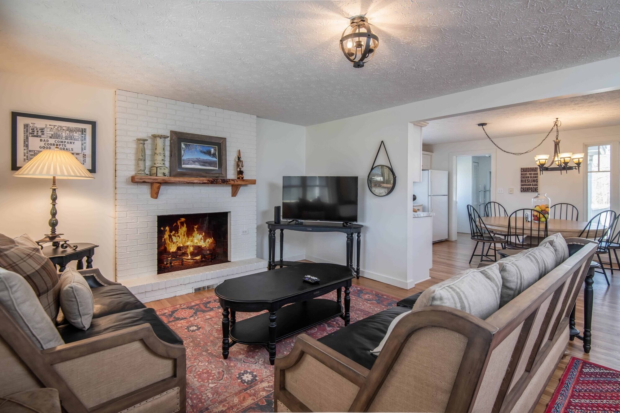 Classic white farmhouse style cottage. Perfect for a serene country getaway.