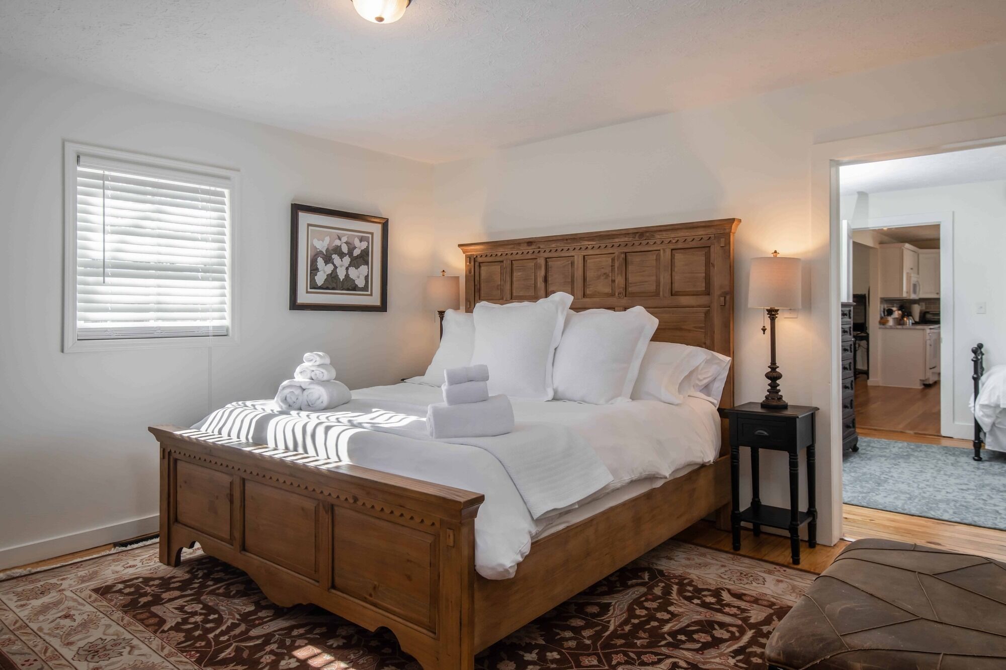 Classic white farmhouse style cottage. Perfect for a serene country getaway.