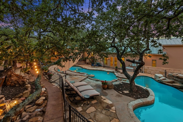 View of both pools at night
