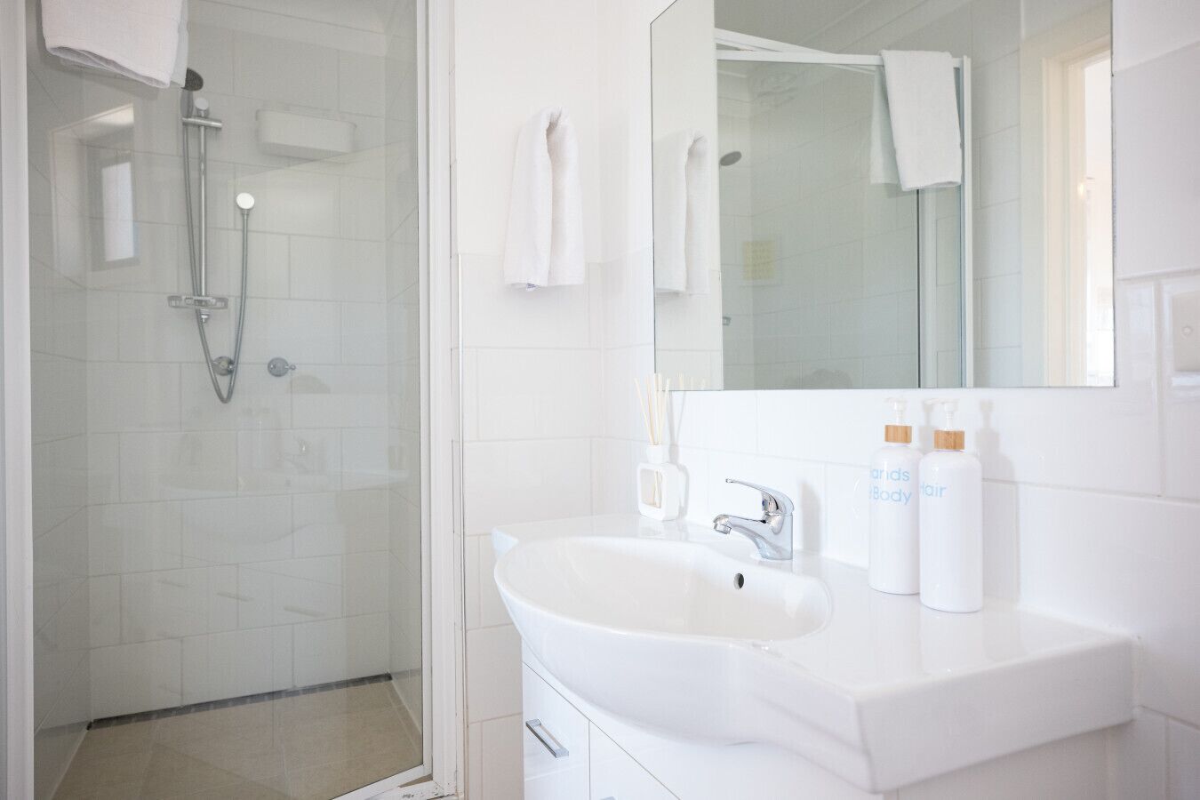 Shower, eco-friendly toiletries, hair dryer, towels