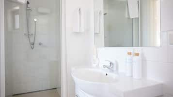 Shower, eco-friendly toiletries, hair dryer, towels