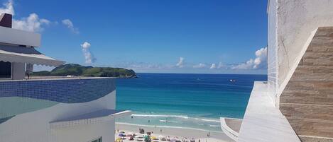 On the beach, sun loungers