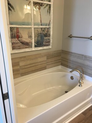 Combined shower/tub, hair dryer, towels, toilet paper