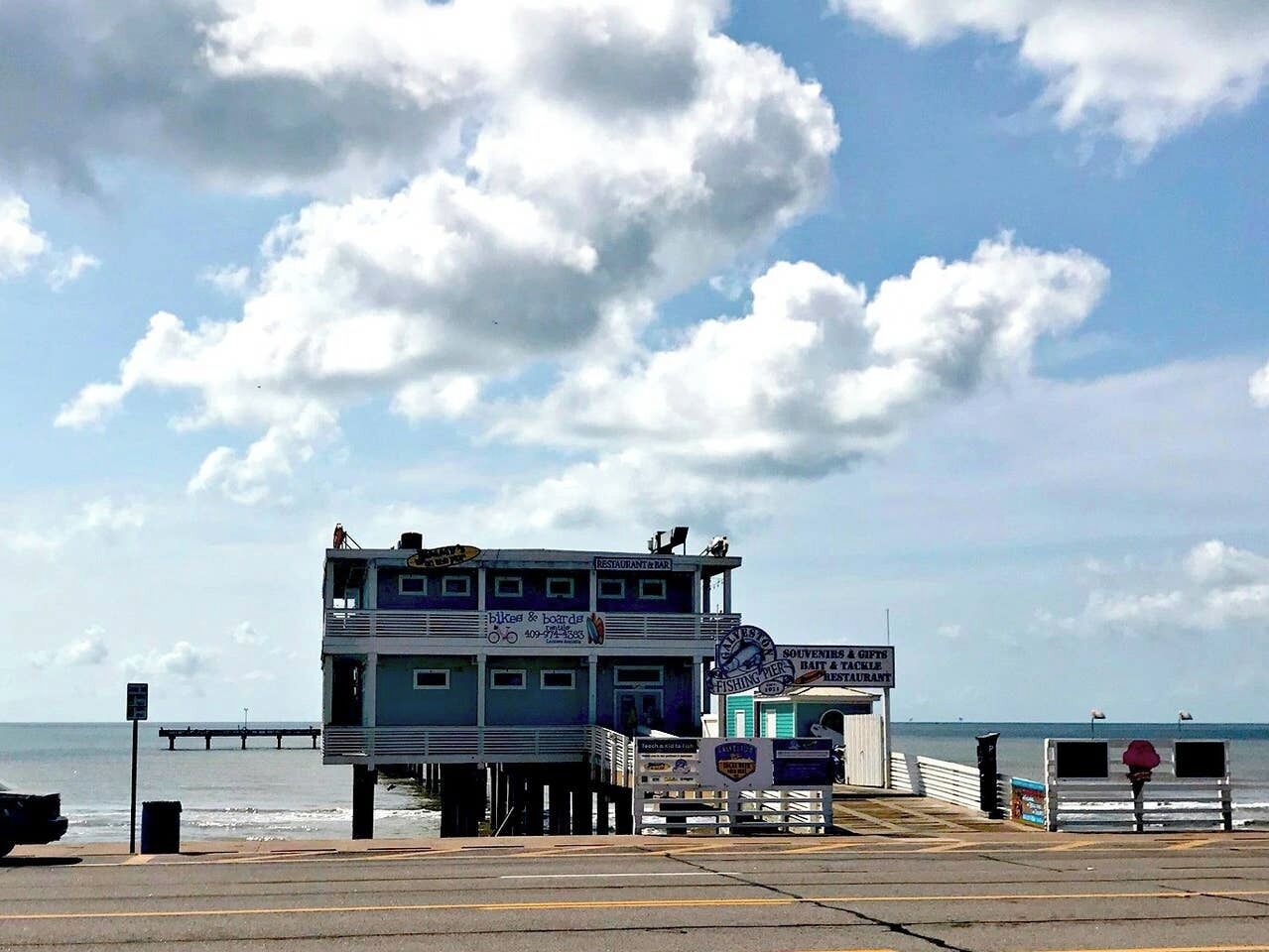 A pier with a restaurant and souvenir shop.