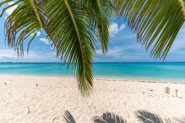 On the beach, sun-loungers, beach umbrellas, beach towels