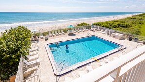 A swimming pool with a view of the beach. - Oceanfront 2BR Condo 2nd Floor Balcony with Beautiful Beach Views, Unit 203 (Indian Harbour Beach)