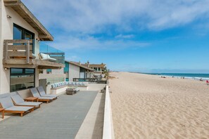 On the beach, sun loungers, beach towels