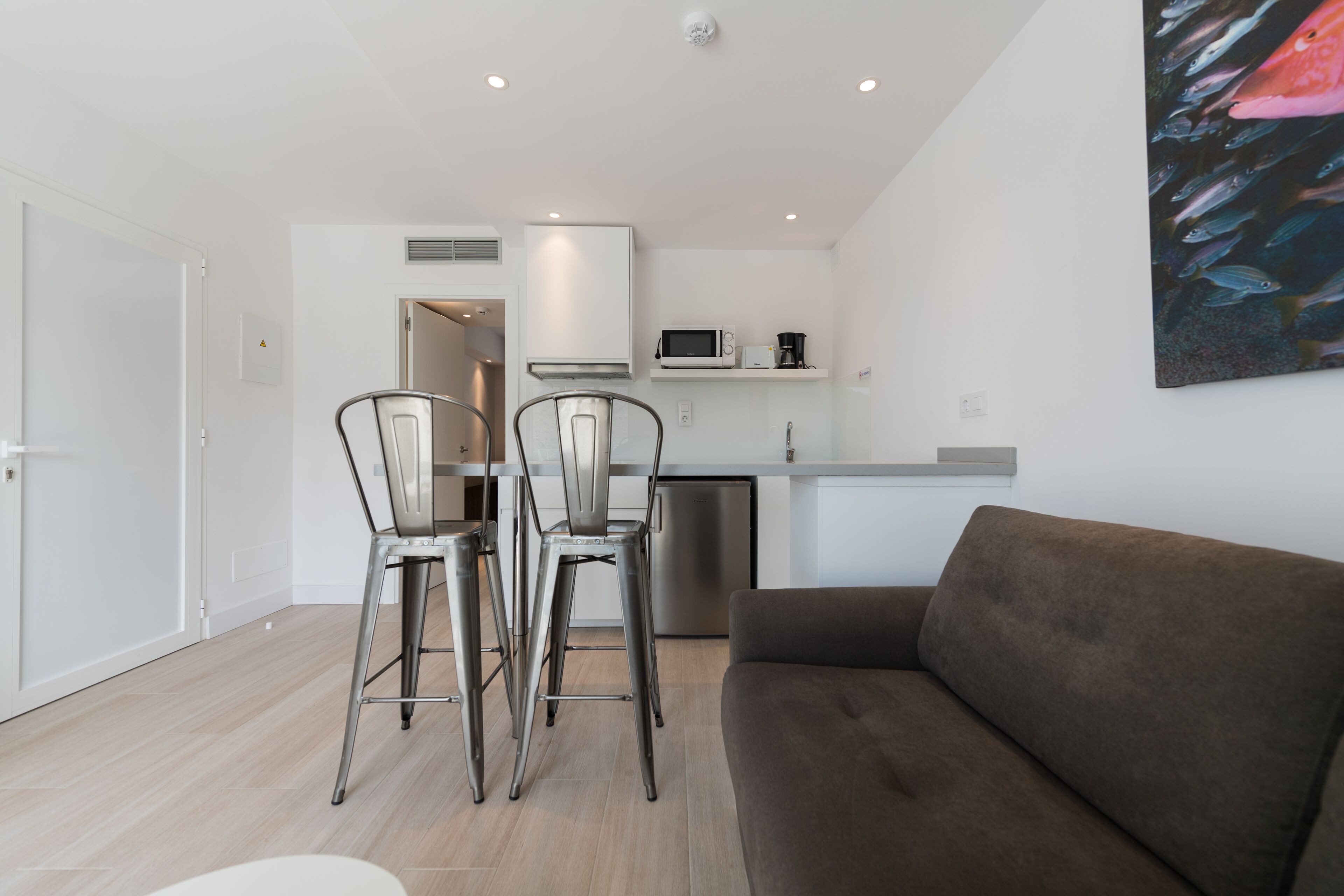 Contemporary apartment with private poolside terrace - sleeps up to three