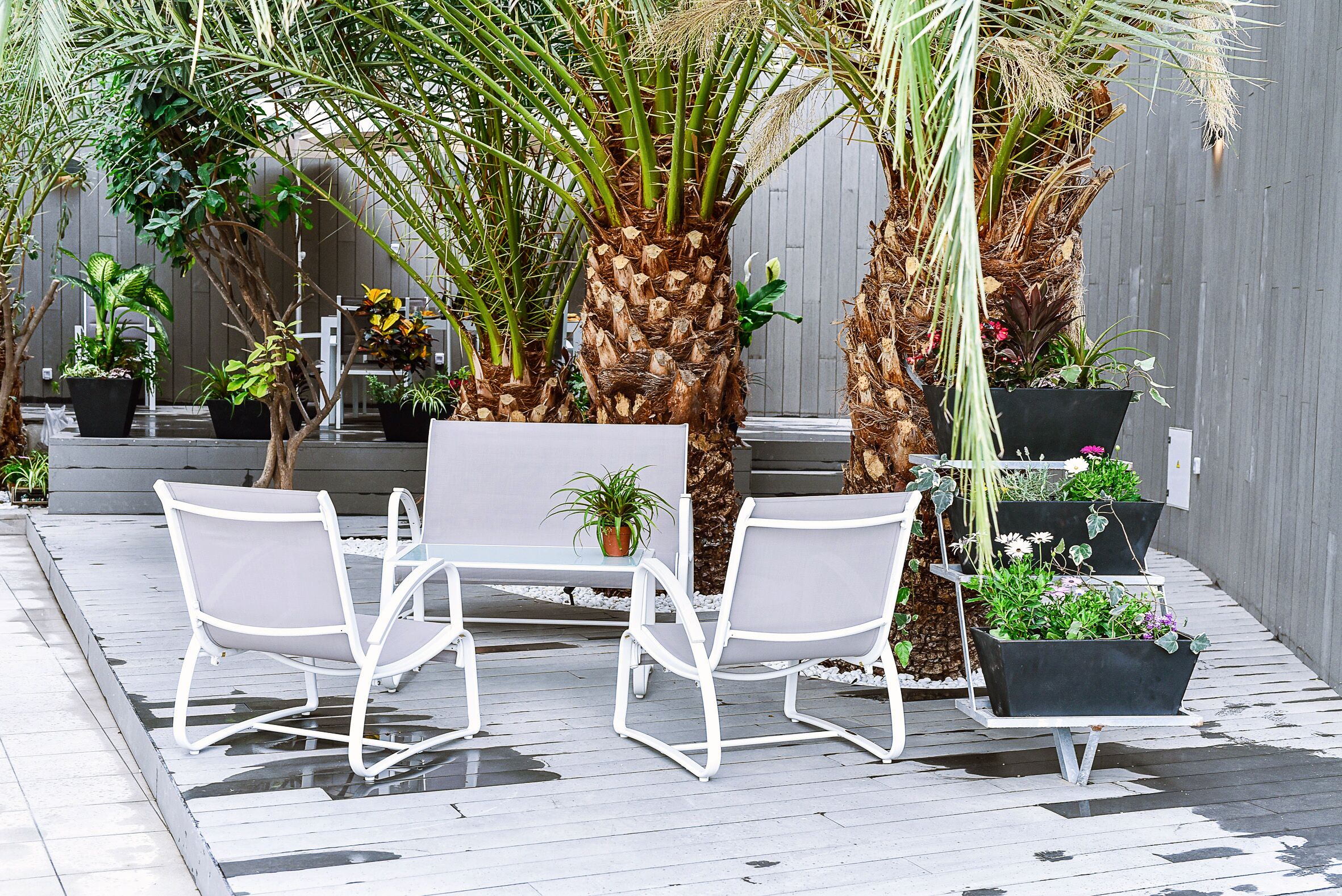 Contemporary apartment with private poolside terrace - sleeps up to three