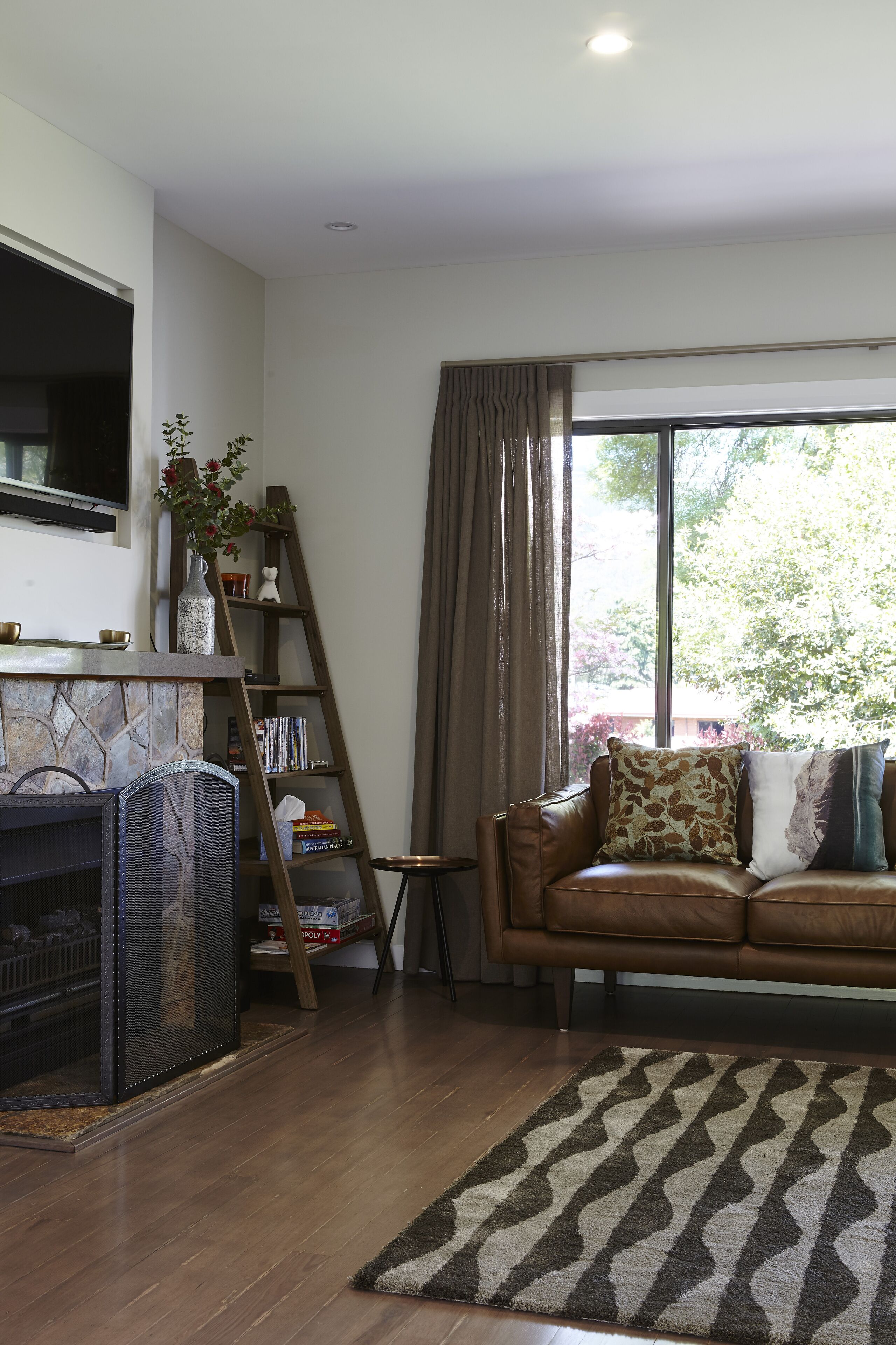 Smart TV, fireplace, DVD player, books