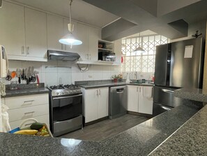 Fridge, microwave, oven, stovetop - Beautiful, Private and Cozy Penthouse in geo center of Lima (San Borja)