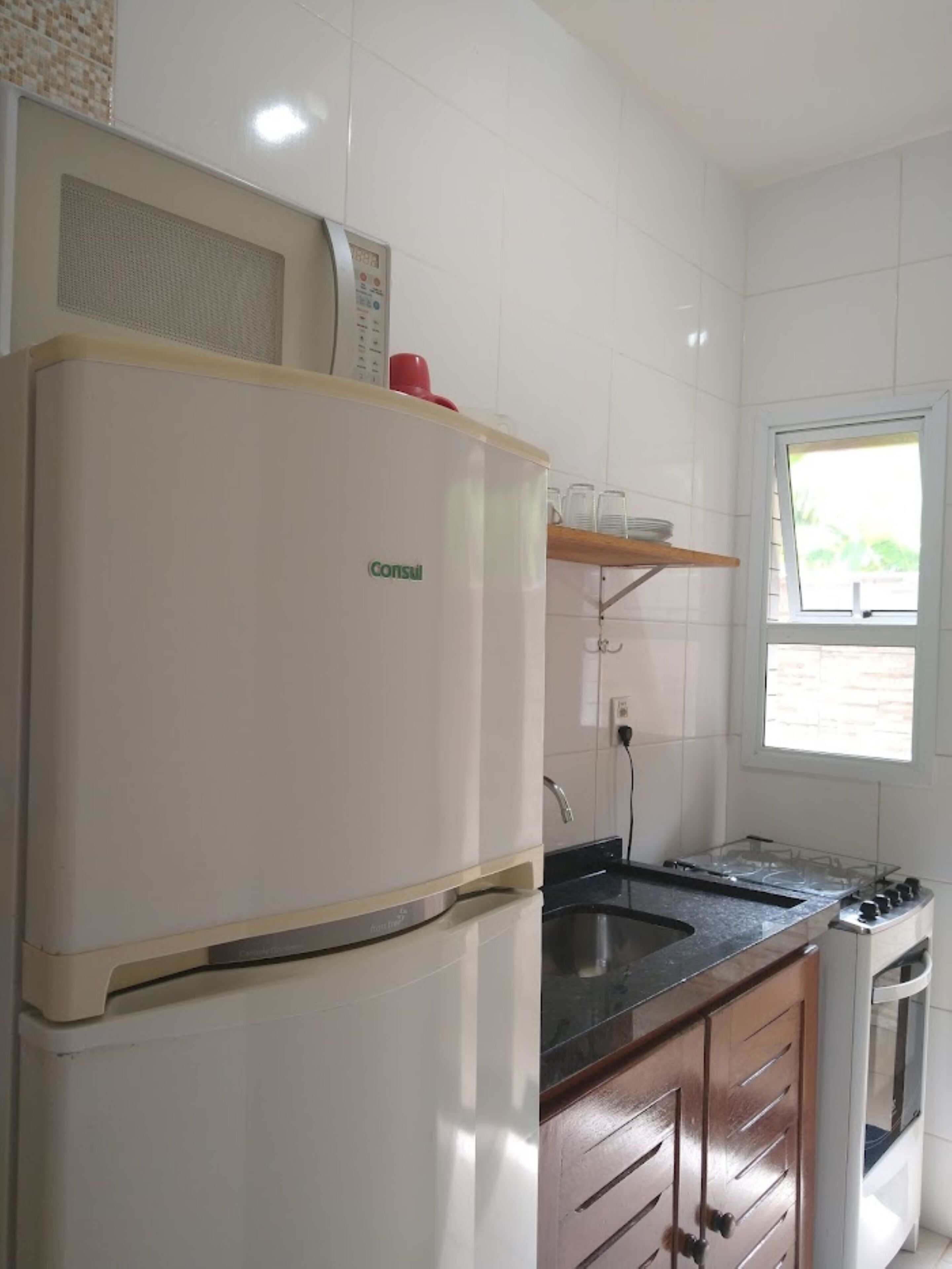 Kitchenette with swimming pool, playground, barbecue, near the beach Martim de Sá- 