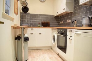 Apartment (1 Bedroom) | Private kitchen | Fridge, oven, stovetop, electric kettle