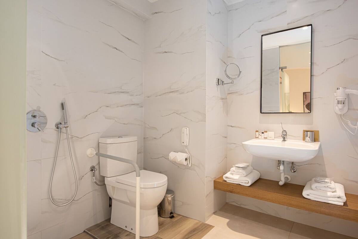double room, accessible | bathroom | shower, hair dryer, slippers, towels