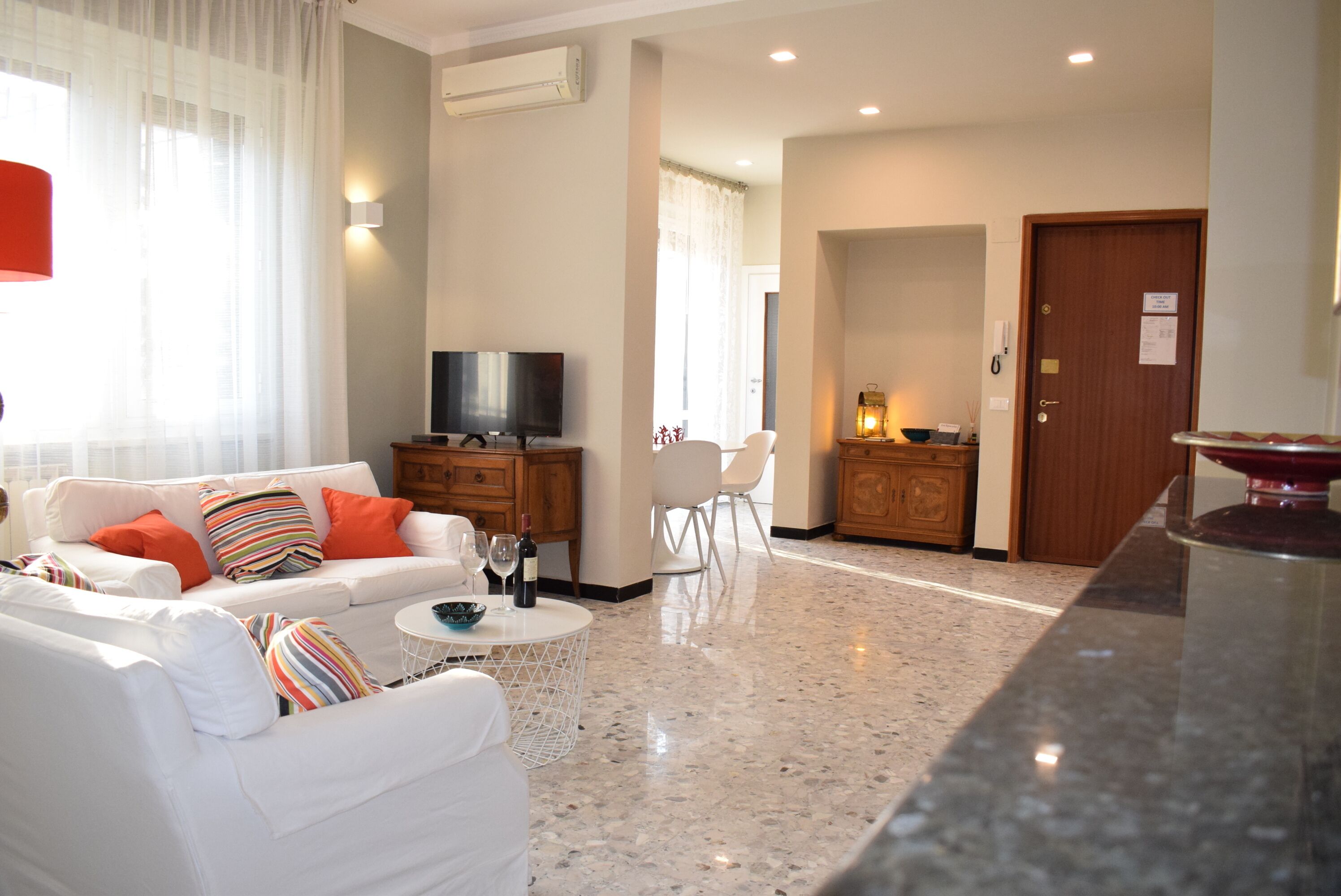 TV, fireplace, books