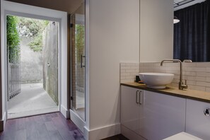 Combined shower/bathtub, hair dryer, towels, soap