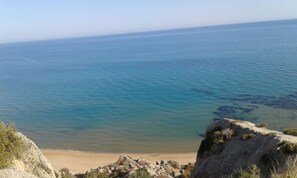 On the beach, sun loungers