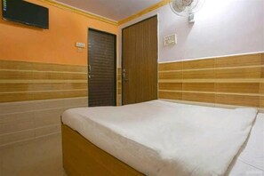 Caja de seguridad en la habitación y camas extra