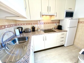 Fridge, microwave, dishwasher, coffee/tea maker