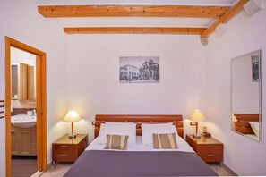 1 habitación, tabla de planchar con plancha, wifi y ropa de cama 