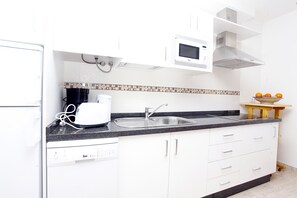 Fridge, microwave, dishwasher, coffee/tea maker