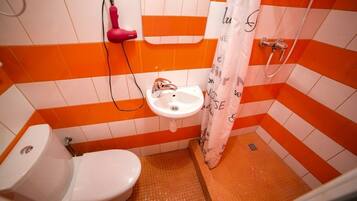 Apartment | Bathroom | Shower, free toiletries, hair dryer, slippers