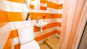 Apartment | Bathroom | Shower, free toiletries, hair dryer, slippers
