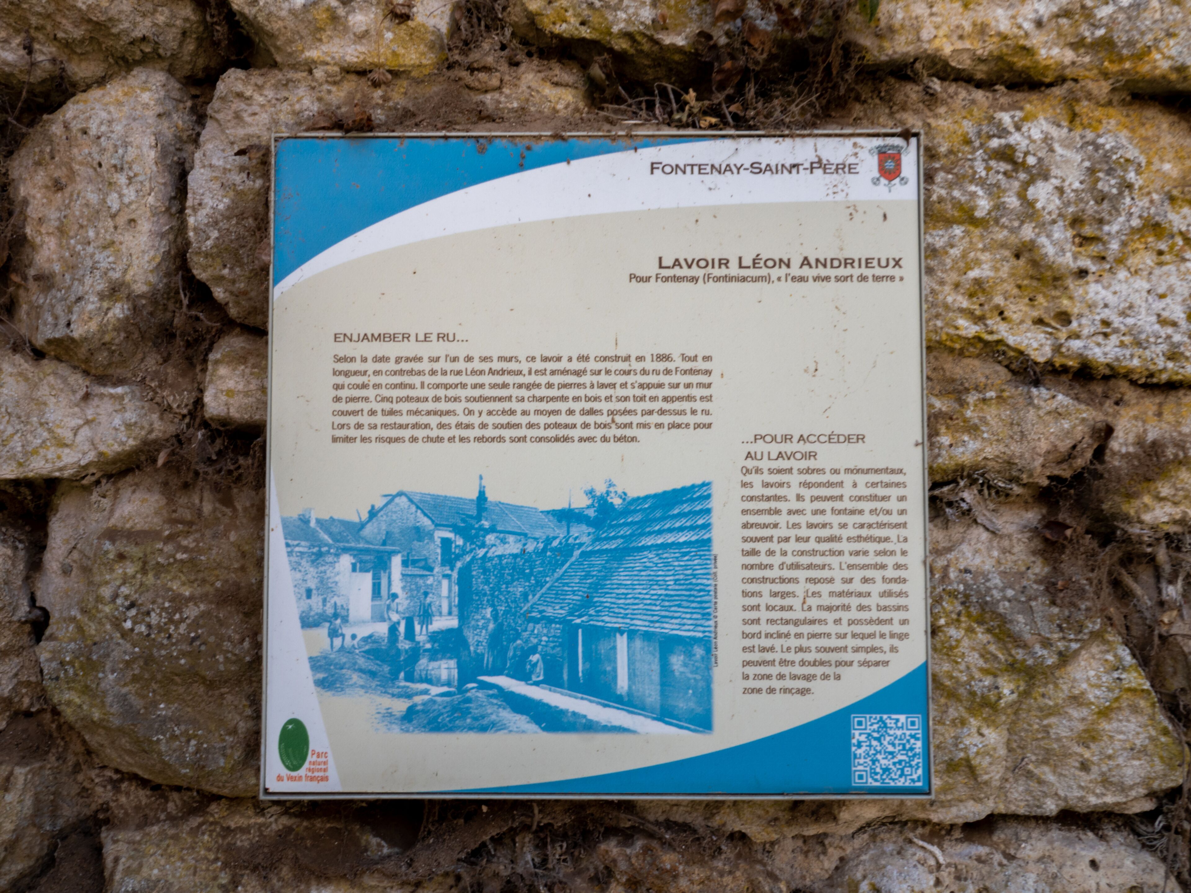 A historical plaque detailing the construction of a water mill in Fontenay-Saint-Pierre.