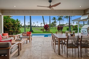 Outdoor dining - Hale Hokuloa by Alekona Kauai: 4BR Luxury ocean & golf view home w AC, private pool, large lanai (Koloa)