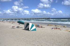 On the beach, sun-loungers, beach towels