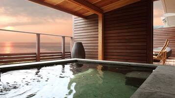 Unwind by the serene ocean-view pool, surrounded by a warm and inviting atmosphere.