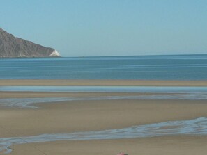 On the beach, sun loungers