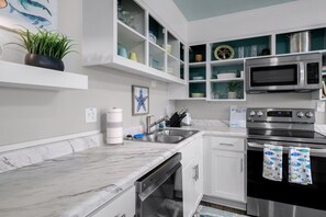 Fridge, microwave, oven, stovetop - "Starfish" - Canal Condo, 2 Bedrooms / 1.5 Bathrooms (Holden Beach)