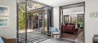 Bunker Bayhouse—Beachfront Retreat next to Resort