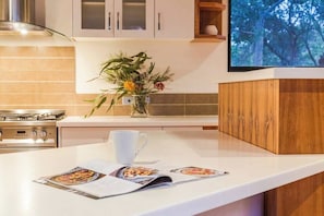 Coffee/tea maker, fridge, microwave, oven