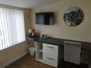 Habitación doble Deluxe | Ropa de cama de alta calidad y decoración personalizada