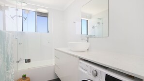 Combined shower/tub, hair dryer