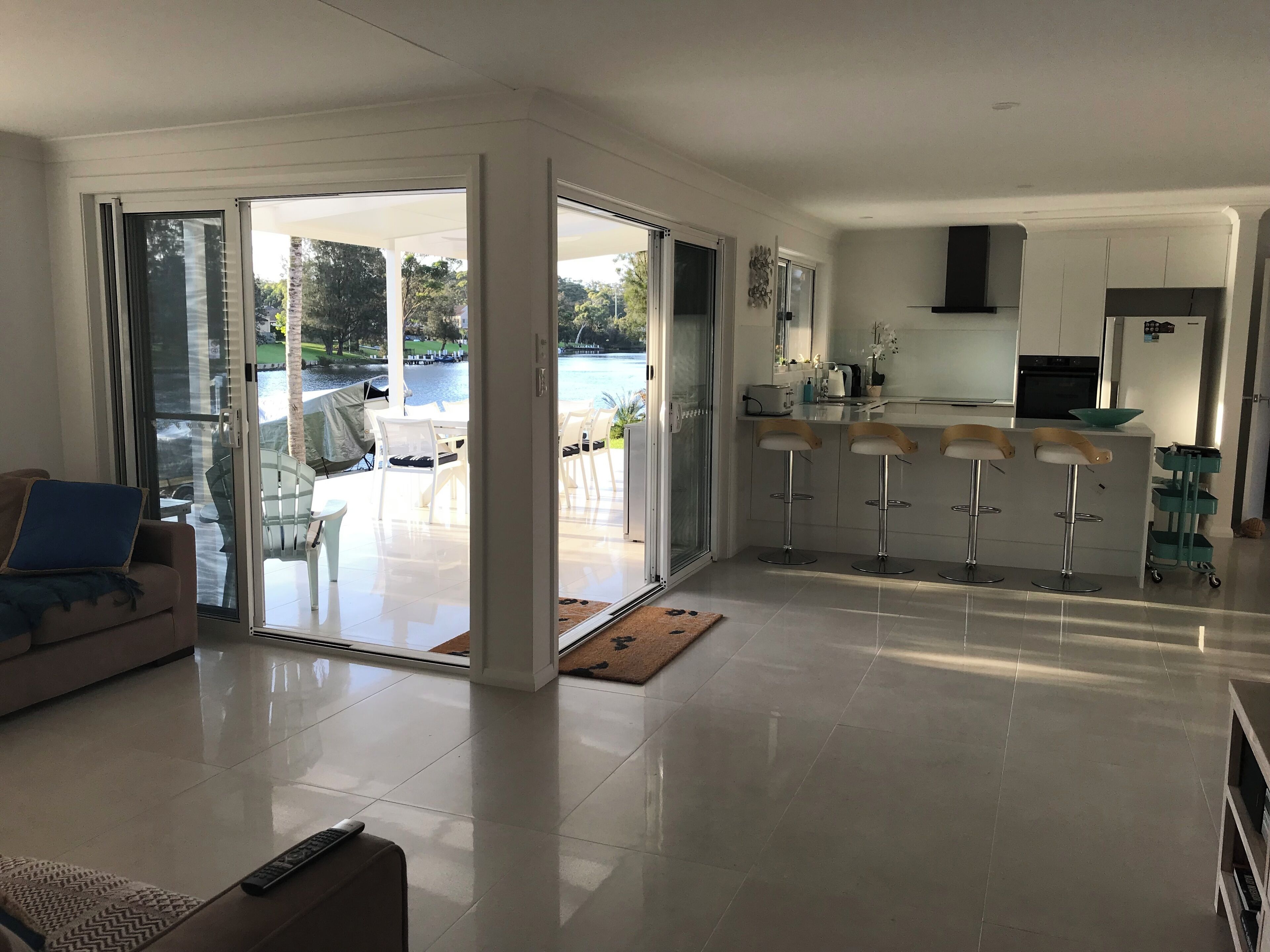 All new open plan living areas connect lounge, kitchen and dining areas to deck