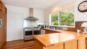 Fridge, dishwasher, toaster, cookware/dishes/utensils