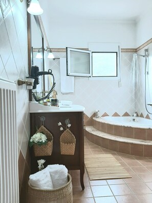 Shower, jetted tub, hair dryer, slippers